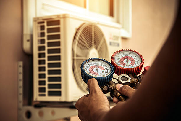 Professional Hvac technician working in Tybee Island, GA
